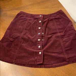 Corduroy plum color skirt with buttons